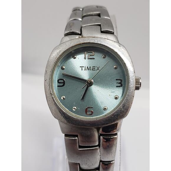 Women's Timex watch. Blue iridescent face. Silver band. Water resistant 30M